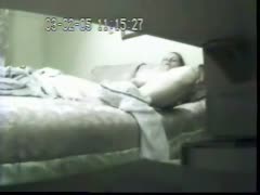 The camera hidden in the bedroom records a slutty wife masturbating hard